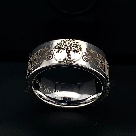 This truly beautiful Celtic Family Tree Tungsten Wedding Ring is more like a work of art than a piece of jewelry. The ring measures 9mm in width. The profile of the ring is flat with high polished texture. The inner part is rounded for Comfort Fit.Please confirm your finger size with the local jeweler before placing the order. This simple and elegant Unisex Wedding Ring can make a perfect Wedding Band, Anniversary Ring and Promise Ring for both Men and Women. * Metal Tungsten Carbide * Width 9mm Tree Of Life Ring Wedding Bands, Male Lord Pf The Rings Ring, Men Fairy Wedding Ring, Men’s Wedding Rings Dragon, Men Viking Wedding Rings, Lord Of The Rings Wedding Band, Viking Wedding Rings, Black Tungsten Mens Rings, Viking Wedding Ring