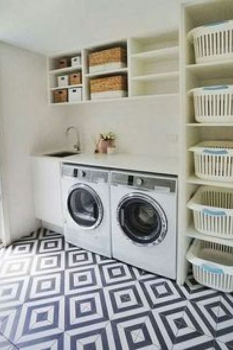 (paid link) No matter how small your space is, laundry room ideas don't have to be limited. Consider built-in shelving or storage closets to maximize the use of wall space in a smaller room. Invest in stackable washer and dryer units that can easily be hidden away behind doors. Utilize drawers, bins and baskets for organized storage solutions that are both practical and aesthetically pleasing. Hang drying racks from the ceiling to conserve floor space while providing an area to air dry delic Laundry Room Decorating, Laundry Room Organization Storage, Laundry Room Storage Shelves, Laundry Room Ideas Small Space, Drying Room, Small Laundry Room Organization, Tiny Laundry Rooms, Room Storage Diy, Laundry Design