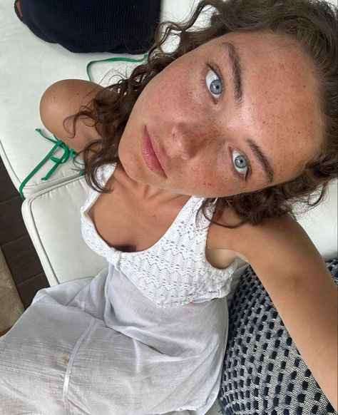 Brunette girl with curly hair, freckles and blue eyes Dark Curly Hair Blue Eyes, Brown Hair Blue Eyes Freckles, Curly Brown Hair Blue Eyes, Brown Hair Freckles, Freckles Blue Eyes Brown Hair, Curly Hair Freckles, Brown Hair And Blue Eyes Girl, Brunette Hair Blue Eyes, Curly Hair And Freckles