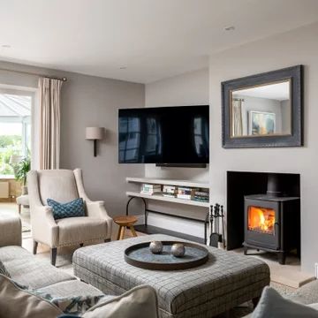 75 Beautiful Living Room with a Wood Burning Stove and a Wall Mounted TV Ideas and Designs - December 2022 | Houzz UK Mezzanine Living Room, Wall Mounted Tv Ideas, Small Coastal Living Room, Wood Burning Stove Ideas, Mounted Tv Ideas, Beach Style Living Room, Coastal Living Room Ideas, Beautiful Living Room Ideas, Stove Ideas