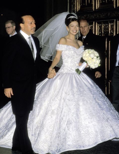 In honor of engagement and wedding season, we're reminiscing with these throwback photos of Thalia and her husband Tommy Mottola's big day! Latina Wedding, Tommy Mottola, S Wedding Dress, Wedding Captions, Popular Wedding Dresses, Bridal Gowns Vintage, Celebrity Wedding Dresses, Tulle Bridesmaid Dress, Weddings By Color