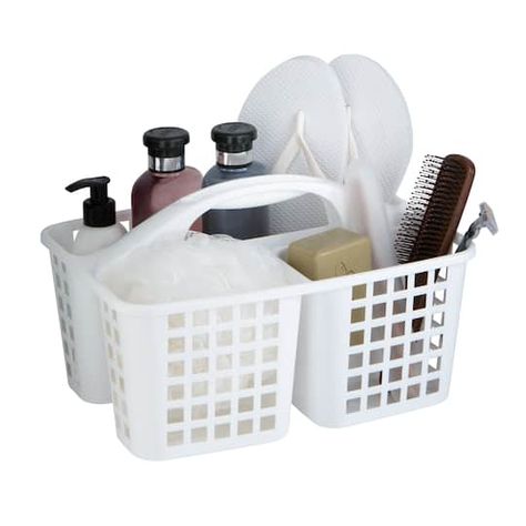 "Shop Simplify White Utility Caddy at Michaels. com. Keep your toiletries or cleaning supplies organized with the Simplify Utility Caddy. Keep%20your%20toiletries%20or%20cleaning%20supplies%20organized%20with%20the%20Simplify%20Utility%20Caddy.%20The%20convenient%20built-in%20handle%20allows%20you%20to%20easily%20transport%20and%20carry%20your%20items.%20The%20open%20hole%20design%20allows%20water%20to%20drain.%20The%203%20compartments%20makes%20this%20great%20for%20organizing%20your%20bath%20pr Shower Caddy College, College Dorm Bathroom, Caddy Basket, Bedside Caddy, Cleaning Supply Storage, Dorm Supplies, Portable Bathroom, Dorm Bathroom, Bathroom Caddy