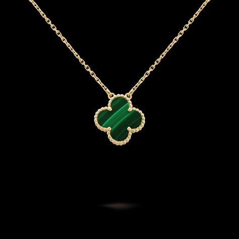 Faithful to the very first Alhambra® jewel created in 1968, the Vintage Alhambra creations by Van Cleef & Arpels are distinguished by their unique, timeless elegance. Inspired by the clover leaf, these icons of luck are adorned with a border of golden beads. Vintage Alhambra pendant, 18K yellow gold, malachite. Vintage Alhambra Pendant, Alhambra Pendant, Golden Beads, Heritage Collection, Van Cleef Arpels, Van Cleef, High Jewelry, Clover Leaf, Black Red