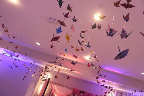 Wedding decoration with paper crane Paper Crane Chandelier, Paper Crane Garland, Decoration With Paper, Dorm Vibes, Male Living Space, Origami Decor, Paper Cranes, Pinterest Contest, Origami Bird