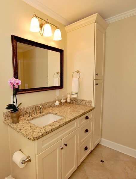 Vanity area with tall linen storage Bathroom Offset Sink, Bathroom Vanities One Sink, Bathroom Sink With Tall Cabinet, Vanity Counter Over Toilet, Bathroom Vanity And Tall Cabinet, Bathroom Vanity One Sink Offset, Space Between Vanity And Toilet, One Sink Bathroom Vanity With Storage, Offset Bathroom Sink And Mirror