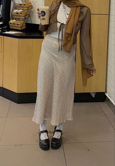 Brown cardigan, skirt, mary janes Maryjane Shoe Outfit Skirt, Skirt And Mary Janes Outfit, Mary Janes Outfit Winter, Pumps Outfit Winter, Marry Jane Outfits, Brown Mary Janes Outfit, Mary Jane Shoes Outfit Jeans, Printed Maxi Skirt Outfit, Outfits With Mary Janes