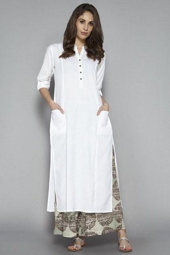 15 Best White Kurti Designs and Patterns For Women Tunik Linen, Plain Kurti Designs, Simple Kurta Designs, Kurta Style, Simple Kurti Designs, Kurti Designs Latest, Long Kurti Designs, Kurta Neck Design, Cotton Kurti Designs