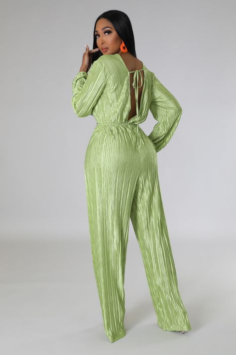 If you're looking for a comfortable and stylish stretch jumpsuit, look no further than the Giada Long Sleeve Pleated Jumpsuit. This versatile piece features a v neckline and long sleeves that are perfect for any weather outing. The pleated design gives it a trendy and sophisticated look, while the elastic waistband ensures a snug fit all day long. Plus, the self tie closure makes it easy to get dressed in a hurry! 100% polyester Inseam is 34 inches Hand wash cold Model is wearing a small Belt no Stretch Jumpsuit, Pleated Jumpsuit, Simple Accessories, Green Material, Hot Outfits, Unique Dresses, Trendy Fashion Women, Online Clothing Stores, Bright Green