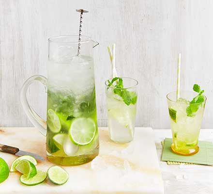 Make a jug of refreshing mojitos to share, so you can spend more time with your guests. Try our three twists on this classic cocktail, too Cocktail Jug Recipes, Jug Cocktail Recipes, Cocktails For Party, Colourful Cocktails, Mojito Pitcher, Cocktail With Vodka, Pineapple Mojito, Fun Party Drinks, Pitcher Drinks