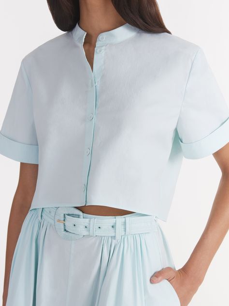 Our cropped, short-sleeved Jude-B shirt in Glacier focuses on elegant tailoring, perfect for transitional dressing. Pair it with our matching Judi Skirt for a coordinated look that effortlessly transitions from day to night. Mandarin Collar Shirt Women, Transitional Dressing, Mandarin Collar Shirt, Skirt Details, Suntan Lotion, French Guiana, Faroe Islands, Cayman Islands, Collar Shirt