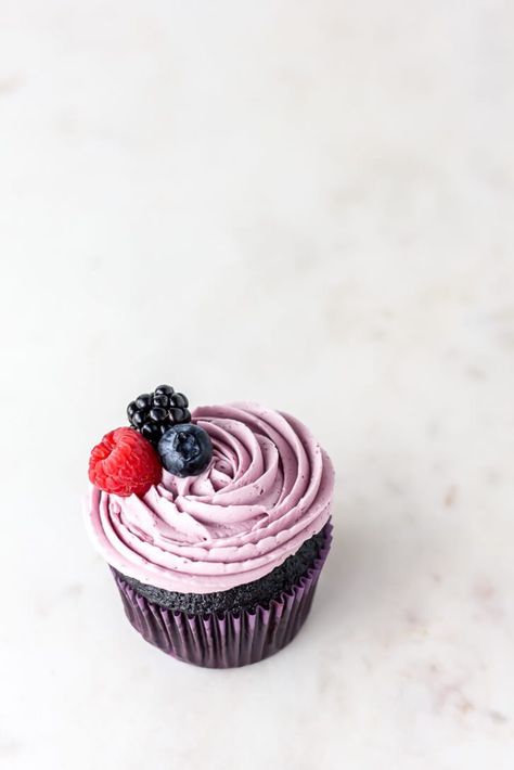 A single Nutella stuffed dark chocolate cupcake frosted with a swirl of triple berry Swiss meringue buttercream and topped with a raspberry, blueberry, and blackberry. Stuffed Chocolate Cupcakes, Berry Buttercream, Berry Frosting, Cake Shot, Dark Chocolate Cupcakes, Nutella Cupcakes, Coffee Cupcakes, Raspberry Cupcakes, Nutella Spread