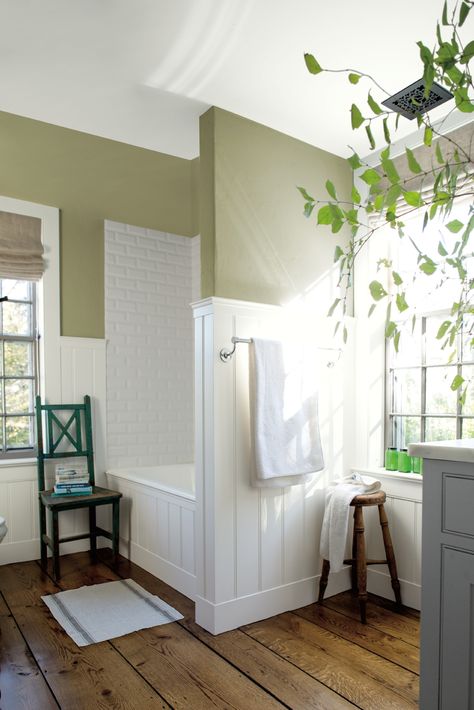 A fresh, spa-like green paint color is perfect for the master bathroom. Bassett Hall Green CW-480, from the Benjamin Moore Williamsburg® Paint Color Collection, could be your next go-to for a sophisticated bathroom renovation.  Walls: Bassett Hall Green CW-480, Aura® Bath & Spa, Matte // Ceiling: Harwood Putty CW-5, Aura® Bath & Spa, Matte // Trim: Harwood Putty CW-5, Aura®, Semi-Gloss. // Cabinet: Slate CW-700, ADVANCE®, Satin. Bassett Hall Green Benjamin Moore, Benjamin Moore Bassett Hall Green, Trending Bathroom Colors, Small Bathroom Paint Colors, Grey Bathroom Floor, Modern Farmhouse Paint Colors, Best Bathroom Paint Colors, Warm Grey Paint Colors, Small Bathroom Paint