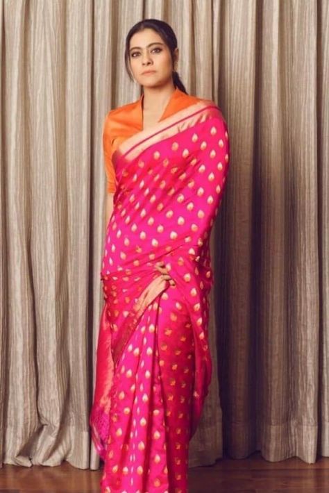 Pink banarasi saree : This six-yard beauty is a serene bollywood style saree that is skillfully made by Gold Zari Weaving in Pallu with Exclusive Dual Border Design. We have poured all the love into careful Weaved the banarasi silk saree for a wedding is paired with Contrast unstitched blouse fabric. Kajol Saree, Kajol Devgan, Sari Blouse Designs, Indian Saree Blouses Designs, Saree Blouse Patterns, Saree Blouse Designs Latest, Orange Blouse, Trendy Blouse Designs, Contrast Blouse