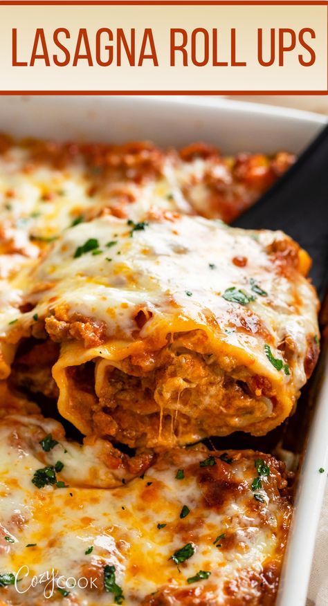 lasagna rollups in a casserole dish, topped with cheese. Rolled Up Lasagna, Best Lasagna Roll Ups Recipe, Three Cheese Sausage Lasagna Roll Ups, Lasagna Roll Ups Freezer Meal, Lasagna Rollups Pioneer Woman, Italian Sausage Lasagna Roll Ups, Lasagna Roll Ups Cottage Cheese, Beef Lasagna Roll Ups, Sausage Alfredo Lasagna Roll Ups