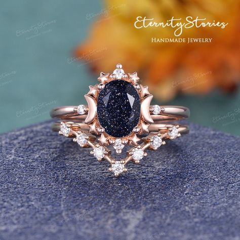 "Vintage Moon And Star Galaxy Crystal Wedding Set Blue Sandstone Engagement Ring Bridal Open Wedding Band Unique Celestial sparkly Ring Women ✧✧Jewelry detail✧✧ Item As Shown in Solid 14K Rose Gold Also available in white gold, yellow gold / Solid 14K & 18K ✦ Center stone: Blue Sandstone , oval Cut - Measure: 6*8mm ✦ Side stones: 0.2ct colorless moissanite or diamond(H SI) ✦ Shank width: 1.4mm ✦ Shank thickness at the bottom: 1.2mm ✧✧SERVICE✧✧ ✦Rush Order/ Shipping Upgrade/ Engraving/ Size Upgra Celestial Engagement Ring, Sandstone Engagement Ring, Open Wedding Band, Dainty Wedding Band, Wedding Band Unique, Celestial Ring, Blue Engagement Ring, Moon Wedding, Blue Sandstone