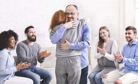 Positive people hugging during group rehab therapy by Prostock-studio. Sign of relief. Positive people hugging during group rehab therapy #Affiliate #group, #rehab, #hugging, #Positive Hug Therapy, My Healing Journey, Life Back On Track, People Hugging, Motivation Theory, Humanistic Psychology, Applied Psychology, Group Counseling, Therapy Quotes