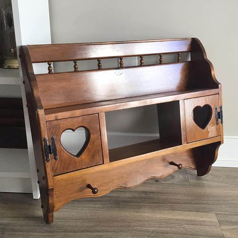 Vintage Wood Display shelf with 2 Doors , Wall Wooden Shelf with 2 Hooks and Hearts on Doors Some wear due to age, still looks really nice. ---------------- Please visit my store for more fantastic items to buy! https://www.etsy.com/ca/shop/VTGItemsAddedDaily All photos are real. You buy exactly what you see in the photos. Shipping Packages are shipped within 48 hours and most times are shipped out within 24 hours! If you wish to see my listings as soon as I add them to my shop, just click on th Easy Wood Shelf, Small Cute Shelves, Old Shelves, Heart Furniture, Wood Display Shelf, Vintage Shelves, Heart Shelf, Pretty Furniture, Items To Buy