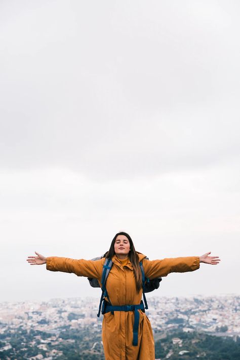 Free Photo | A female hiker outstretching her hands enjoying the fresh air on top of mountain Female Hiker, Top Of Mountain, Woman On Beach, World Illustration, Wood Illustration, Happy Friends, Happy Travels, People Illustration, Group Of Friends