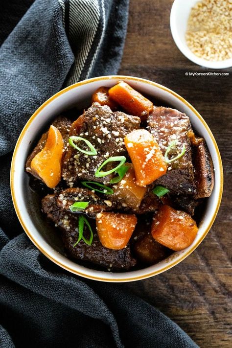 Instant Pot Korean short ribs recipe.  Try this super flavorful Korean short ribs made in an Instant Pot (or in any other electric pressure cooker). The sticky sauce glazed meat is bone fall apart tender and lip-smacking delicious! Today, I'm sharing my first instant pot recipe. In case you don't know, Instant Pot is a Korean Braised Short Ribs, Korean Stew, Instant Pot Korean, Short Rib Stew, Korean Short Ribs, Beef Recipe Instant Pot, Stew Beef, Beef Ribs Recipe, Beef Short Rib Recipes