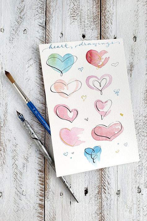 This tutorial will show you how to mix and match five different heart drawings and watercolor backgrounds using a calligraphy pen and a brush. Calligraphy Heart, Homemade Watercolors, Heart Drawings, Heart Art Projects, Valentines Day Drawing, Valentines Watercolor, Whimsical Art Paintings, Whimsical Heart, Learn Watercolor Painting