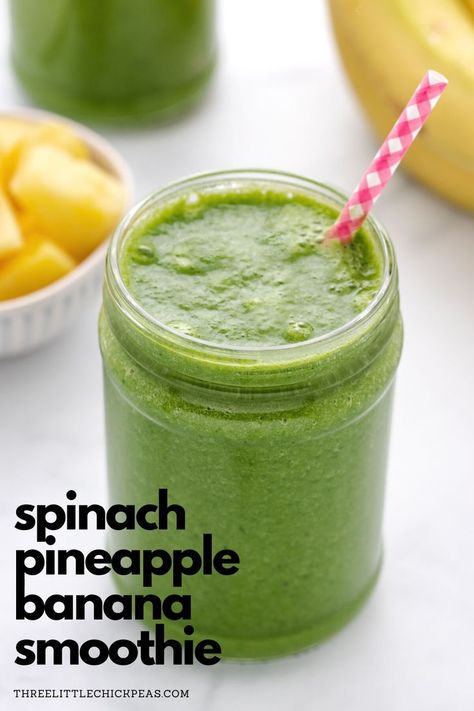 Spinach pineapple banana smoothie in a glass jar with a straw. Pineapple Spinach Smoothie Healthy, Spinach Banana Pineapple Smoothie, Spinach Pineapple Smoothie Recipes, Spinach Mango Smoothie Recipes, Celery Pineapple Smoothie, Spinach Banana Smoothie Recipes, Spinach Pineapple Smoothie, Arugula Smoothie, Banana Pineapple Smoothie