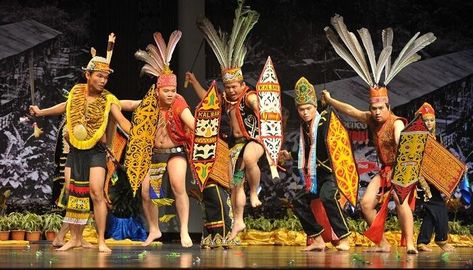 On this day, the homes of the Dayaks will be open to visitors. In the longhouses, a practice called masu pengabang takes place where guests will be served with tuak by the host before they can enter the longhouse. The Gawai Dayak festival may last up to several days, with visitors being welcomed to the homes of the Dayaks throughout the festival. Hari Gawai Poster, Hari Gawai, Gawai Dayak, Sarawak Cultural Village, East Indies, Breathtaking Places, Cultural Identity, Famous Places, Kind Heart