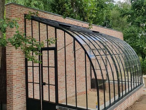 Attached greenhouse in wrought iron and glass in backyard Lean-to, Custom-made Glass lean-to greenhouse in a corner of a courtyard Lean-to, Custom-made Glasshouse in corner attached to 2 walls with additional ventilation shutters at the front Lean-to, Custom-made Freestanding orangery in traditional style built on a wall | Eye-catcher Freestanding, Custom-made Luxury greenhouse as exclusive extension for extra living space and sunlight Lean-to, Custom-made Greenhouse with rustic look i Rustic Veranda, Iron Conservatory, Lean To Greenhouse Kits, Greenhouse Attached To House, Wall Greenhouse, Lean To Conservatory, Victorian Greenhouse, Victorian Greenhouses, Mini Serre