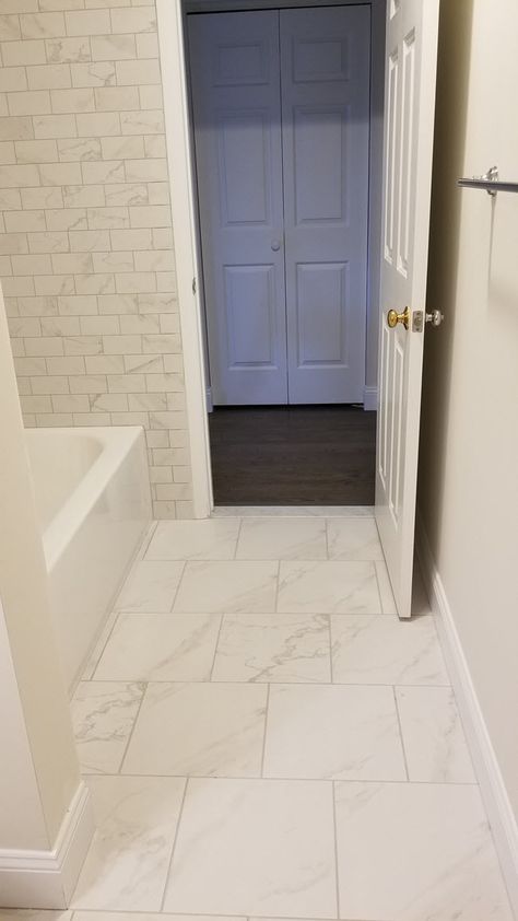 Bathroom Flooring Ideas Marble, Large Marble Tile Bathroom Floor, 8x8 Tile Floor, White Marble Porcelain Tile Bathroom, Big Tiles Bathroom Floor, Faux Marble Bathroom Floor, Tile That Looks Like Marble, Marble Lvt Floor Bathroom, Secondary Bathroom Tile Ideas