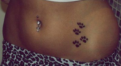 this might HAVE to be my first tattoo! :D Paw Print Tattoo On Hip, Puppy Print Tattoo, Cool Hip Tattoos, Paw Print Tattoo Cat, Tattoo Paw Print, Cute Small Tattoos For Women, Animal Print Tattoo, Cat Paw Print Tattoo, Pet Tattoos