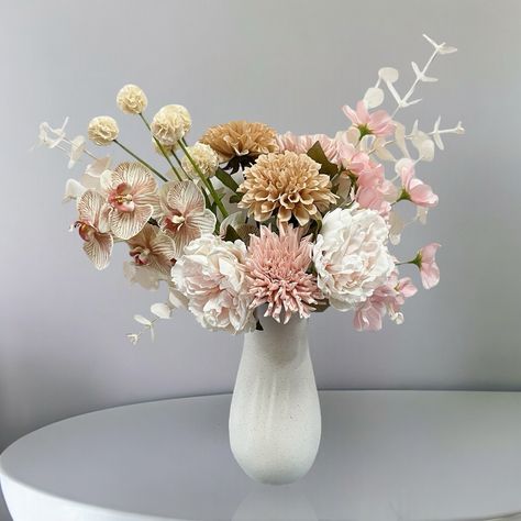 Embrace the beauty of nature with our exquisite artificial flower arrangements. 🌼🌿 This piece, our ‘Stella’ is perfect for bringing warmth and charm to your home. No watering required! Explore our collection at www.seaholly.com.au 💕 #SeahollyFlowers #FloralDesign #interiordecor Pink Cosmos, Sea Holly, Hand Tied Bouquet, Real Touch Flowers, Flower Studio, Silk Flower Arrangements, Plant Vase, Vase Arrangements, Wedding Arrangements