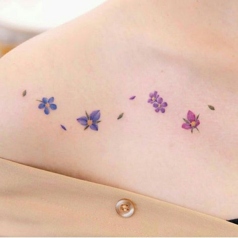 Purple Tattoos For Women, Colourful Tattoo For Women, Small Watercolor Tattoo, Watercolor Tattoo Ideas, Colour Tattoo For Women, Purple Tattoos, Sunflower Tattoo Shoulder, Flower Wrist Tattoos, Watercolor Tattoos