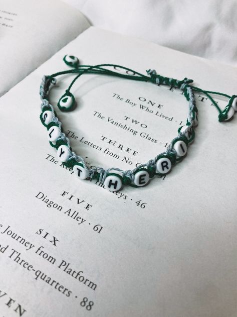 If Slytherin is your Hogwarts House, you'll rock this Slytherin bracelet! Made with green and grey waxed polyester, you can wear your house's colors anywhere you go. Our bracelets are also adjustable, so you don't have to worry about sizing at all! These will also be perfect for trips to Universal. Get yours today at the link! Slytherin Bracelet, Agatha Harkness, Harry Potter Houses, The Vanishing, Clay Bead, Hogwarts Houses, Bracelet Ideas, Fort Myers, Braided Bracelets