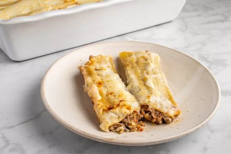 Beef-Filled Cannelloni (Manicotti) in Béchamel Recipe The Spruce Eats Recipes, Spruce Eats Recipes, Beef Cannelloni Recipes, Beef Cannelloni, Bechamel Recipe, The Spruce Eats, Cannelloni Recipes, Pasta Bakes, Easy And Quick Recipes