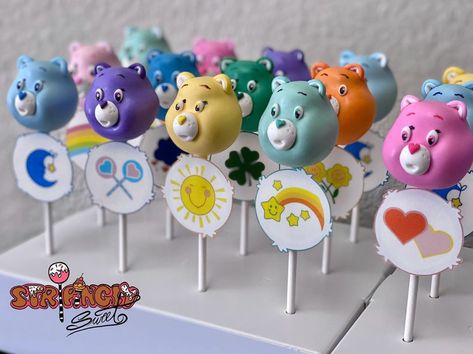 Stripingly Sweet on Instagram: “These cute Care Bears took me back to my childhood 🥰 Had me watching a couple episodes on YouTube 😆 Nostalgia kicked in fast 🤘🏻😆🤘🏻…” Care Bears Cake Pops, Carebear Cake Pops, Care Bear Cake Pops, Care Bear Treats, Youtube Nostalgia, Cute Care Bears, Care Bear Cakes, Alice In Wonderland Props, Care Bears Birthday Party