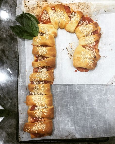 Pizza Candy Cane Crescent | Penny's Food Blog Candy Cane Bread, Crescent Dough, Cute Picture, Shredded Mozzarella, Pizza Sauce, Holiday Table, Fresh Basil, Parchment Paper, Holiday Tables