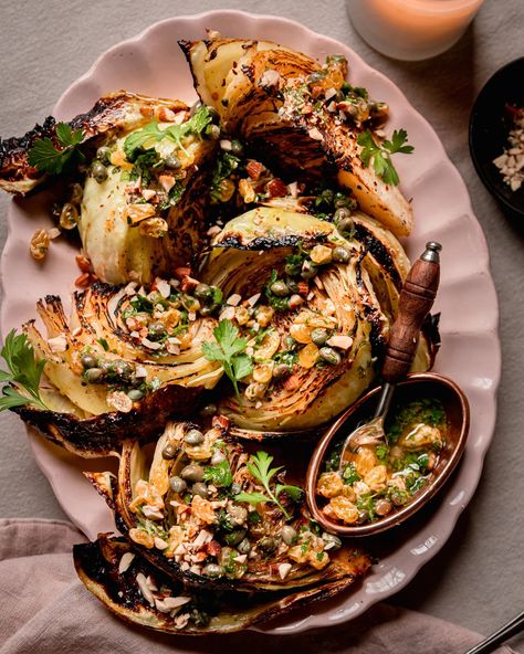 Deeply caramelized and tender roasted cabbage wedges are an ideal contrast to sweet, salty, and tangy caper raisin relish. Ready in 30 minutes Grilled Cabbage Steaks, Cabbage Wedges, Roasted Cabbage Wedges, Grilled Cabbage, Small Cabbage, Vegan Worcestershire Sauce, Roasted Cabbage, Toasted Almonds, Main Courses