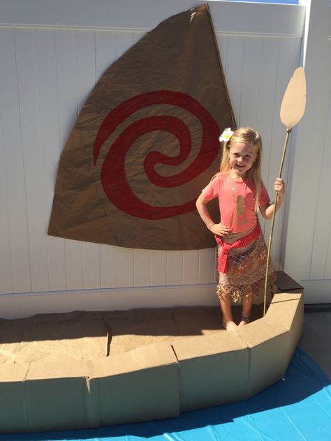 Moana boat photo prop. Made with two cardboard boxes, craft paper, bamboo sticks from the gardening section, a blue table cloth from the dollar store, red paint. Disney Moana Birthday Party, Moana Birthday Party Ideas, Moana Birthday Party, Moana Birthday, Disney Moana, Birthday Party Ideas, Moana, Party Ideas, Birthday Party