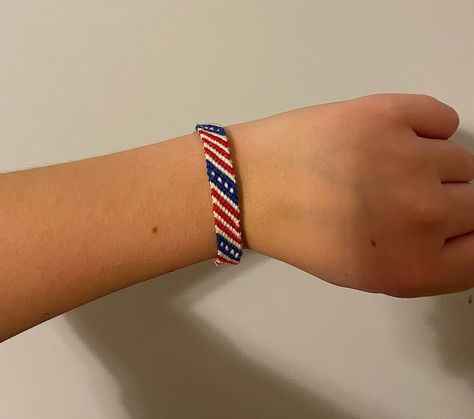 Fun friendship bracelet perfect to show your patriotism for Memorial Day, the Fourth of July, or any regular day! Handmade and perfect for summer. American Flag Friendship Bracelet, American Flag Bracelet, Handmade Friendship Bracelets, The Fourth Of July, Macrame Bracelets, Braided Bracelets, Friendship Bracelet, Fourth Of July, Memorial Day