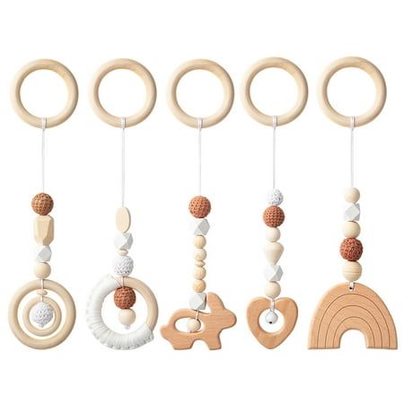 5 Baby Play Gym Toy Set Package included 5 pcs wooden hanging toy with different cute shape Color: Beige,White,Brown Size: About 11 inch Warm Tips: 1. Adult supervision is recommended when your baby playing the gym toy. 1. Adult supervision is recommended when your baby playing the gym toy. 2.Must inspect before use. If damaged, please discard immediately. Size: 11". Baby Hanging Toys, Infant Play, Baby Play Gym Toys, Wooden Baby Gym, Baby Gym Toys, Baby Play Gym, Baby Teether Toys, Stroller Toys, 5 Babies