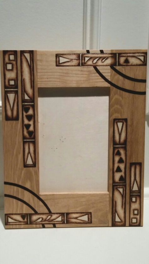 Wood burning (pyrography) by Alicia Schlitz. Picture frame. Burned areas were masked off before applying stain for the best contrast Wood Burn Picture Frame, Pyrography Picture Frame, Wood Burning Picture Frame, Wood Burning Patterns Free, Wood Burning Patterns For Beginners, Free Wood Burning Patterns, Wood Burned Frames, Diy Wood Burning, Trivet Design