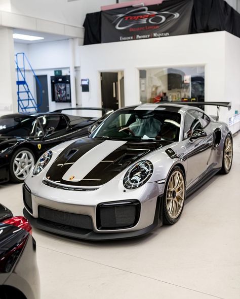 Porsche 991 GT2 RS painted in GT Silver w/ the Weissach Package, exposed carbon fiber and White Gold Magnesium wheels. Parked next to it is a Ferrari F50 painted in Nero  Photo taken by: @topazdetailing on instagram  Porsche owned by: @chaussurecowboy on Instagram Matt Black Porsche, Porsche Gt3 Rs Black, Porsche 992 Gt3 Rs Black, Black Gt3 Rs, Audi R8 Car, 991.2 Gt3 Rs, Cardboard Box Car, Car Wheels Diy, Wheel Craft