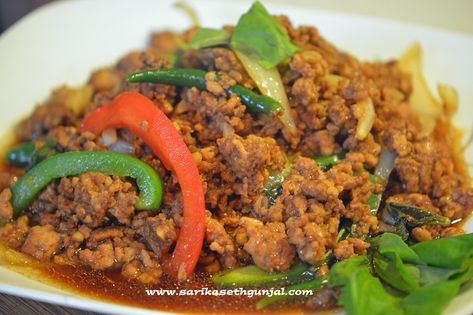 Thai Basil Chicken also know as Pad Kra Pow Gai, is a very popular dish in Thai cuisine.  Thai cuisine has gained popularity in the last few years where we see a Thai restaurant every few miles. It is made using ground chicken and lot of basil leaves. A very … Pad Kra Pow Recipe, Kra Pow, Chicken Basil Recipes, Asain Food, Gumbo Recipe Sausage, Thai Basil Chicken, Basil Recipes, Gumbo Recipe, Basil Chicken