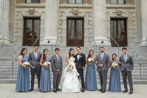 Outdoor Bride, Groom, Bridesmaids and Groomsmen Wedding Portrait, Bridesmaids in Cobalt Blue Matching Dresses, Groomsmen in Grey Suits with Pale Blue Tie, Bride in Strapless Sweetheart Ballgown Wedding Dress with White and Red Floral Bouquet, Groom in Black Tuxedo | Tampa Bay Photographer Marc Edwards Photography | Tampa Venue Le Meridien Steel Blue Weddings, Slate Blue Bridesmaid Dresses, Steel Blue Bridesmaid Dresses, Groom Suit Black, Slate Blue Wedding, Groom Suit Grey, Dusty Blue Dress, Outdoor Bride, Groom And Groomsmen Suits