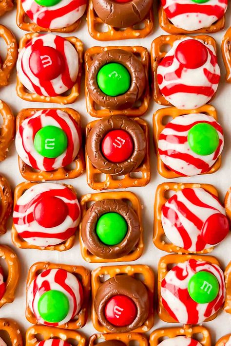 I mean this holiday sweet and salty treat is silly easy! Just a few ingredients to make these Pretzel Hershey Kiss M&M treats and everyone loves them! Pretzel Hershey Kiss, Pretzel Hershey Kisses, Easy Christmas Treats Recipes, Pretzel Kisses, Pretzel Chocolate Bites, Traditional Cookies, Salty Desserts, Everyday Food Recipes, Pretzel Treats