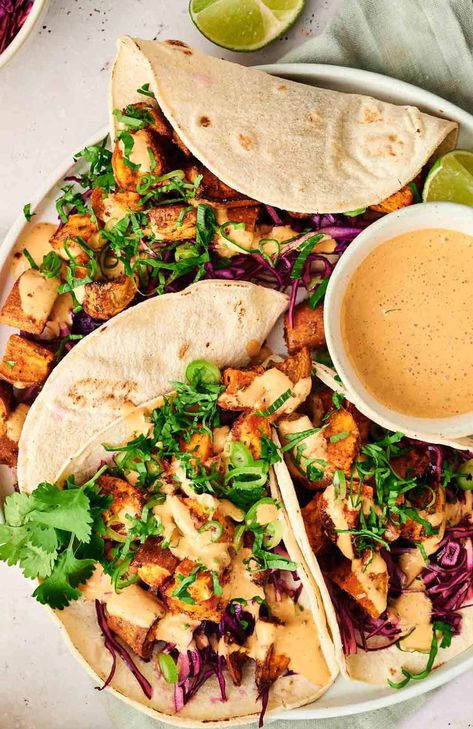 Sweet Potato tacos on a plate with a dipping sauce. Crispy Potato Tacos, Sweet Potato Tacos, Quick Meal Prep, Potato Tacos, Vegan Entree, Chipotle Sauce, Vegan Sweet Potato, Taco Night, Quick Meal