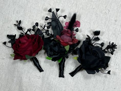 Pin on Boutonniere comes with 2 pins for your convenience 💕 Feel free to request different ribbon color or any customization including matching with a bouquet 🤗💕 We will be sending you photos for confirmation before shipping! 😍 Please check out our entire store for more awesome arrangements and bouquets!😇 We are a Full Service Florist 💐 That means that we can make and customize anything!💕 We make our bouquets and arrangements using highest quality silk and dried flowers!😇 You don't need to preserve them! They will stay with you forever as long as you keep them at the room temperature and don't expose them to the humidity 🌸 Please let us know your wedding date and ribbon color for your items, you can select burlap or twine instead of a ribbon as well 🤗 If you need your order in le Goth Groomsmen Attire, Gothic Wedding Boutonniere, Goth Boutonniere, Burgundy Boutonniere, Black Groomsmen, Black Rose Bouquet, Gothic Wedding Theme, Button Holes Wedding, Goth Wedding