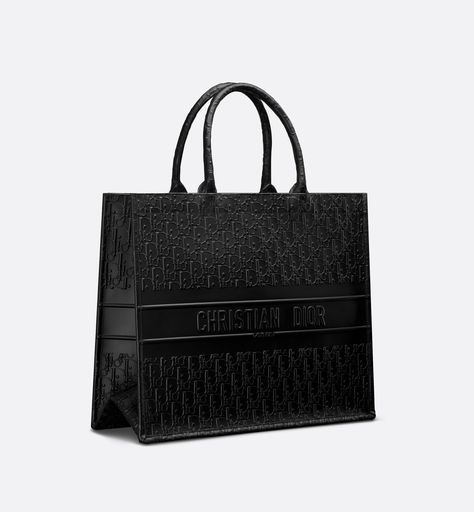 Introduced By Maria Grazia Chiuri, Creative Director Of Christian Dior, The Dior Book Tote Has Become A Staple Of The Dior Aesthetic. Designed To Hold All The Daily Essentials, The Black Calfskin Style Is Embossed With A Dior Oblique Motif And Is Further Enhanced By The Christian Dior Paris Signature On The Front. The Large Tote Exemplifies The House's Signature Savoir-faire And May Be Carried By Hand Or Worn Over The Shoulder.. Christian Dior Black Bag, Christian Dior Bag Totes, Dior Black Aesthetic, Black Dior Bag, 1800s Dresses, Dior Tote Bag, Christian Dior Bag, Dior Aesthetic, White Apartment