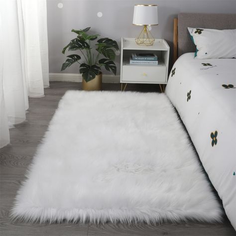 Bring a touch of the natural, silken beauty to your contemporary living space with this luxury sheepskin faux fur rectangular area rug. White Faux Fur Rug, Faux Fur Area Rug, Kid Room Carpet, Faux Fur Rug, Fur Rug, Fluffy Rug, Contemporary Living Spaces, White Rooms, Sheepskin Rug