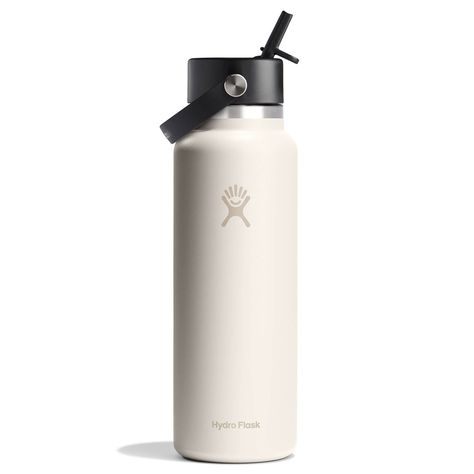 Hydro Flask | 40 Oz Wide Mouth With Flex Straw Cap | Ivory, For Hot and Cold Drinks | From Hydro Flask | Hello, one-handed hydrationA 40 oz Wide Mouth water bottle with our leakproof Flex Straw Cap—easy to fill, easy to drink. Open it up, add your ice, and flip to sip. The insulated stainless steel keeps it cold for up to 24 hours.TempShield®️ double-wall vacuum insulation keeps drinks cold up to 24 hours, hot up to 12Insulated Flex Straw Cap is leakproof when closedMade with 18/8 pro-grade stainless steel for durability, pure taste and no flavor transferWide Mouth opening is ice-cube friendlyColor Last™ powder coat stays clean and colorfulBottle fits most backcountry water filtersBPA-FreeDishwasher safeFlex Straw Cap not intended for use with hot liquidsNot for use on a stove, in a microw Classy Water Bottle, Black Hydro Flask, Hydroflask Aesthetic, Hydro Flask 40 Oz, Canteen Water Bottle, Bottle Sling, Wide Mouth Water Bottle, Beautiful Butterfly Photography, Wide Mouth Bottle