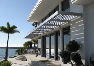 airfoil sunshade residential Design For Windows, Sunshade Design, Exterior Solar Shade, Wood Cladding Exterior, Aluminum Carport, Bahama Shutters, Aluminum Awnings, Metal Awning, Wood Trellis